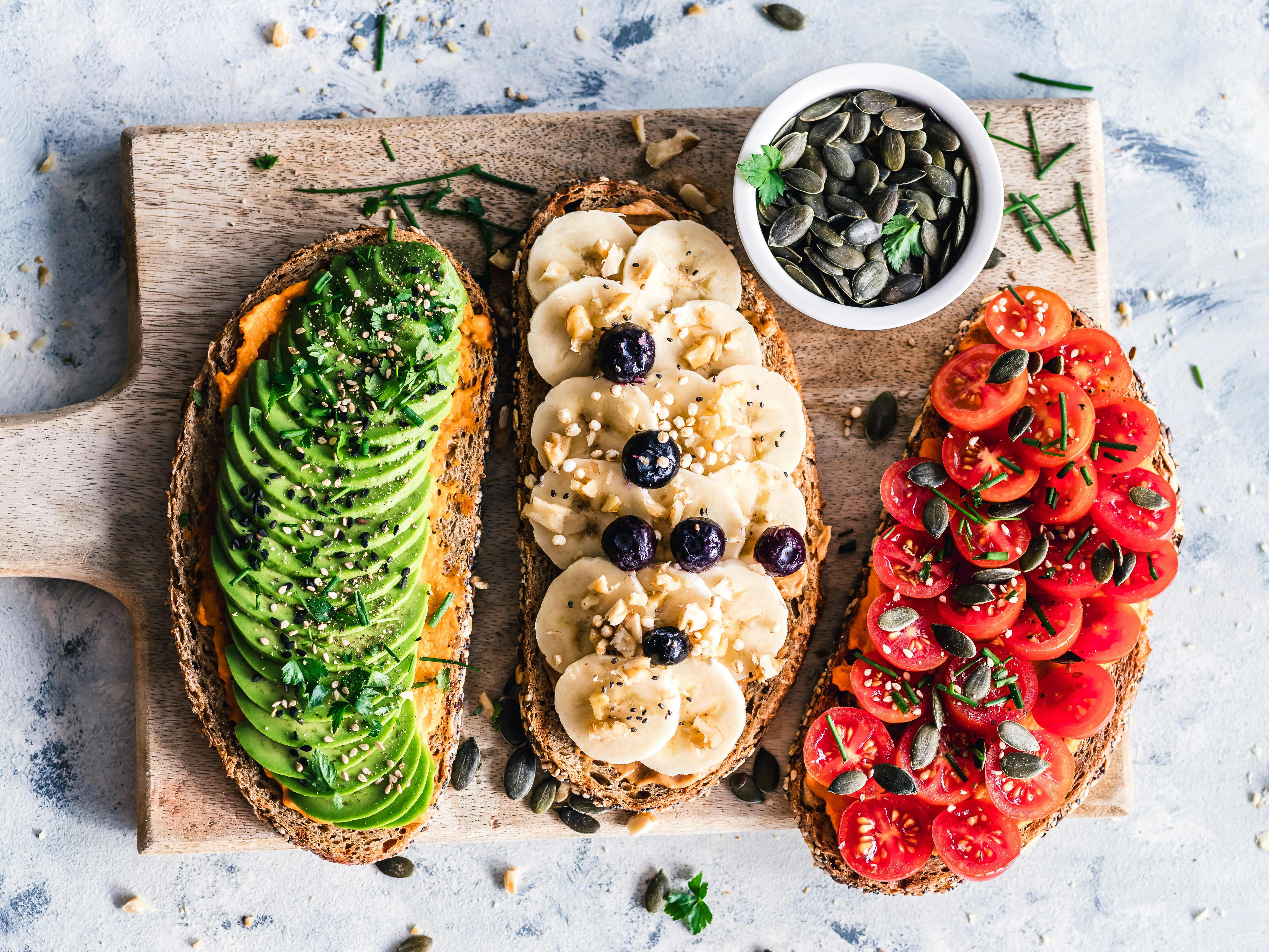 Avocado, banana and tomato on toast